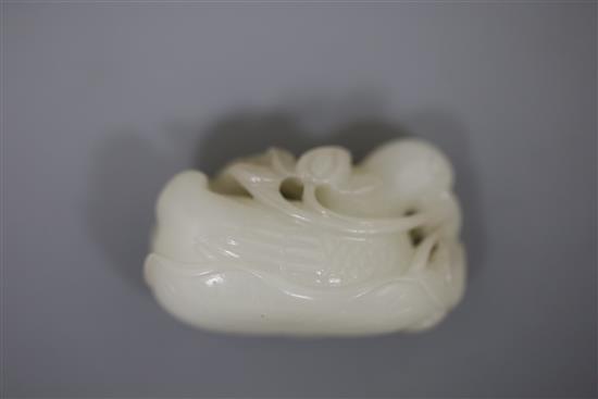 A Chinese white jade group of mandarin ducks, 19th/20th century, L. 4.8cm, wood stand